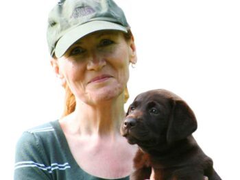 pippa mattinson and chocolate lab puppy